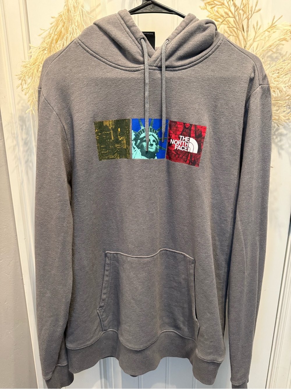 The North Face Men's Gray Pullover Hoodie with Graphic Logo